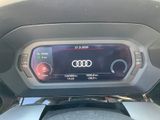 a digital display on the dashboard of a car