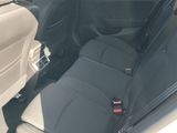 the back seats of a car with a seat belt in a car