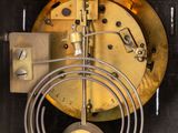 a clock that is sitting in the middle of a box