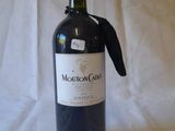 a bottle of wine that is sitting on a table