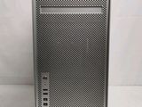 a close up of a silver computer tower on a white surface