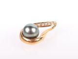 an image of a black pearl and diamond ring on a white background