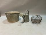 three buckets that are sitting next to each other on a table