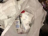 a bag full of cigarettes sitting on the floor