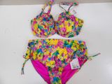 a close up of a bikini and panties on a table