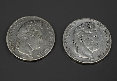 deux pièces d'argent, dont l'une représente la tête d'une femme et l'autre celle d'un homme