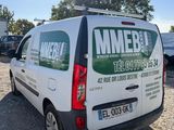 a white van that is parked in a parking lot