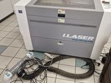 a machine that is sitting on the floor in the room