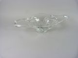 a clear glass bowl with a flower design on it