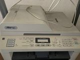 a printer that is sitting on top of a printer