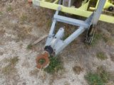 a trailer that has a couple of tools attached to it