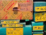 several boxes of various types of film are stacked on top of each other