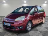 the red citrole is parked on a checkered tile floor