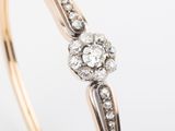 a close up of a diamond ring on a white background