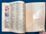 someone is holding a book open to a page of comics