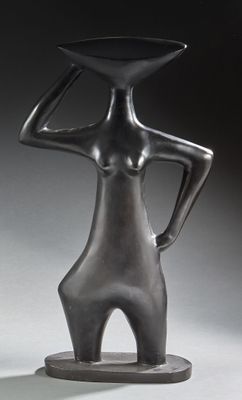 sculpture of a woman holding a bowl on her head
