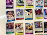 a lot of cards that are on the table