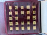 an open book with a bunch of gold coins in it