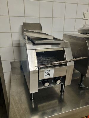 two machines that are sitting on a counter in a kitchen