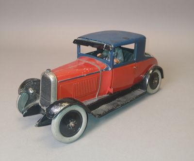 a toy model of a red car with a blue top
