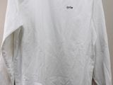 a white long sleeved shirt with the word person written on it