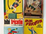 four vintage comic books are on display on a white surface