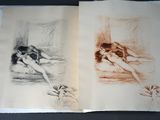 two drawings of a woman and a dog on a table