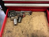 a tool box with tools in it in a garage