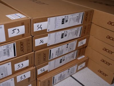 several boxes stacked on top of each other in a room