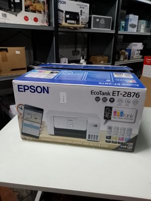 an image of a printer sitting on top of a table in a room