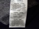 a label on a t - shirt that says it ' s made of wool