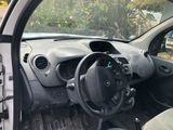 a picture of a car with a steering wheel and dashboard
