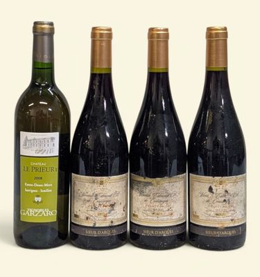 trois bouteilles de vin sont posées les unes à côté des autres sur une surface blanche