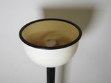 a black and white table lamp with a white base
