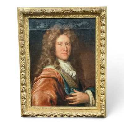 un vieux tableau représentant un homme aux cheveux longs, dans un cadre doré