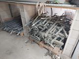 a large pile of metal and wood in a garage