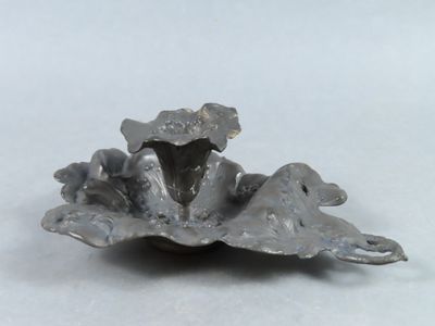 a small metal object that is sitting on a table