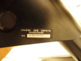 a close up of a car ' s rear view mirror with a sticker on it