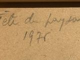 an old book with writing on it sitting on top of a table