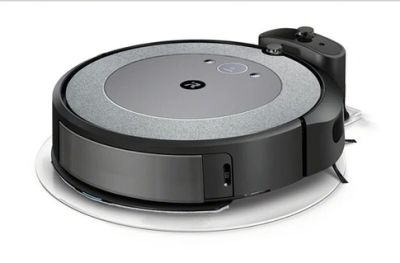 an image of a robotic vacuum cleaner on a white surface