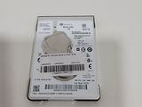 an image of a hard drive sitting on top of a white table