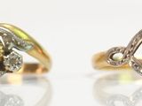 pair of yellow and white gold engagement rings with diamonds