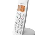 une image montrant un gros plan d'un téléphone portable posé sur un support