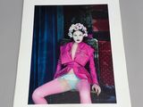 an image of a calendar with a picture of a woman in a pink jacket