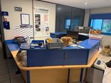 a blue counter in a room with a blue counter top and a blue counter top