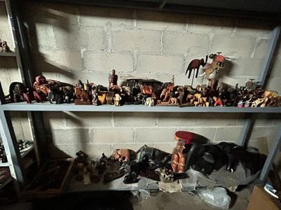 a shelf full of toy figurines on a shelf