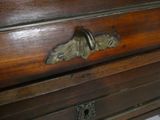 a close up of a drawer with a handle on it