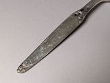 a knife that is sitting on a table