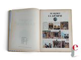 an open book with a picture of a group of people on it