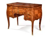 a wooden desk with drawers and a drawer on it
